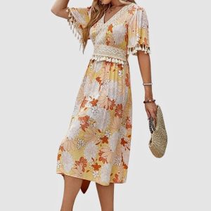 Vestido estampado con detalle de flecos